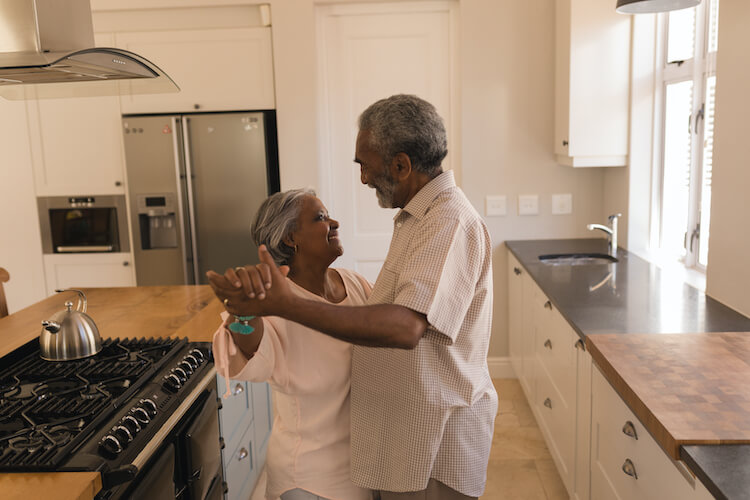 Senior couple comfortable in their home.